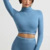Backless Turtleneck Long-Sleeve Crop Top in Steel Blue Backless Turtleneck Long-Sleeve Crop Top in Steel Blue