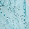 Stevie Embellished Mid-Rise Flared Trousers in Ice Blue
