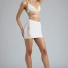 Joni Embellished Mid-Rise Mini Skirt in Ivory