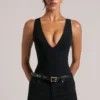 Rumi Deep Plunge Halterneck Bodysuit in Black Rumi Deep Plunge Halterneck Bodysuit in Black